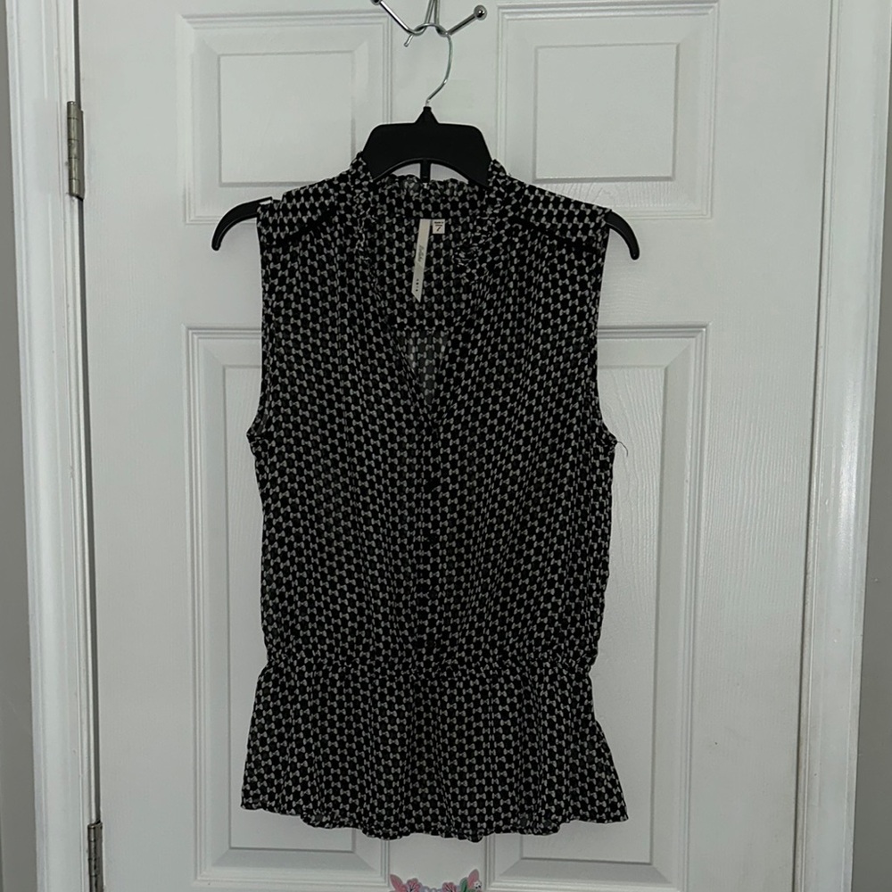 Bellatrix Black and White Sleeveless Peplum Blouse